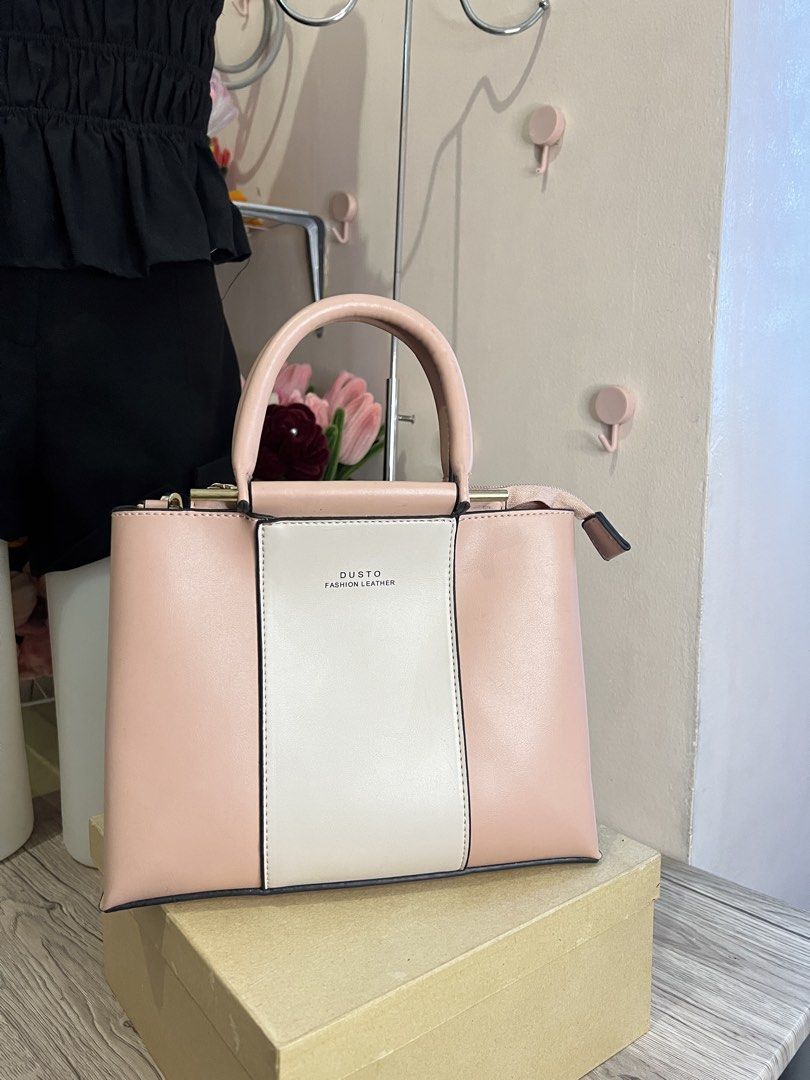 DUSTO Top Handle with sling (Category: Cross-body Bags) located in Quezon City. Submitted by handpicked_collections_ph (Listing ID 1470688572, Image 2). Description: .