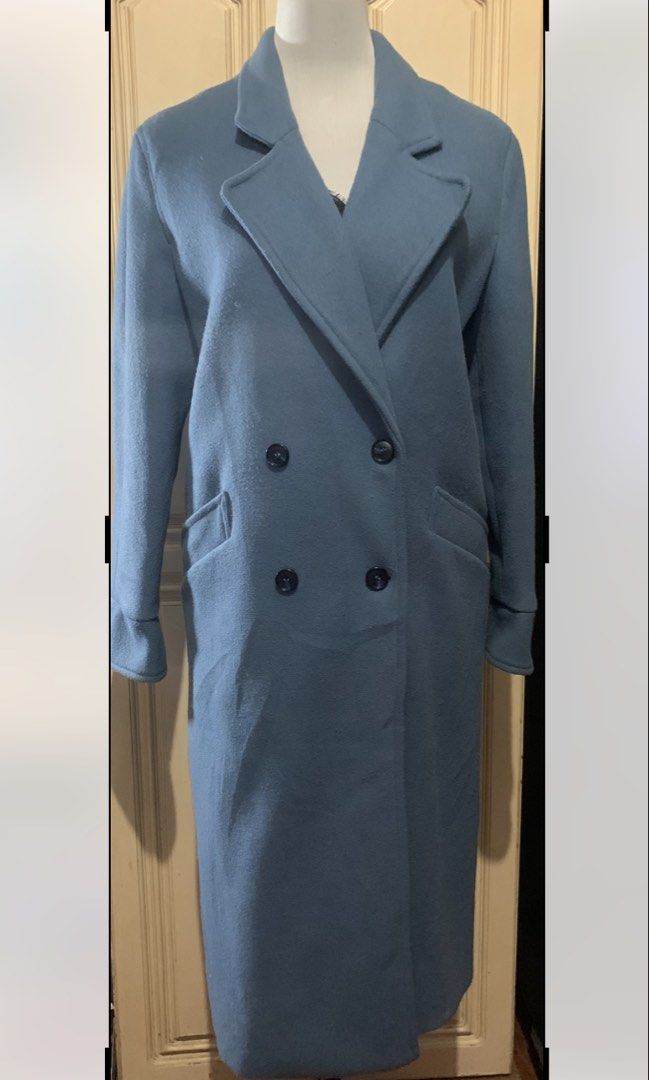 Dusty blue double breasted wool trench coat outerwear (Category: Coats, Jackets and Outerwear) located in Quezon City. Submitted by clothingline4sale (Listing ID 1470611585, Image 1). Description: Grayish Blue Winter Wool Coat Very good condition/ like new Has lining/ has pockets / complete buttons Size: small on tag but fits to large Bust: up to 43” ; Length: 41” ; Arms Circumference: 16” ; Shoulder to shoulder: 17.5” very nice in actual .