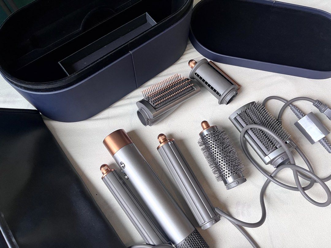 Original Dyson Airwrap V2 Complete Long (Negotiable, Please Send Your Offer) (Category: Hair) located in Taguig. Submitted by declutteringbean (Listing ID 1470602979, Image 3). Description: 💈Details * ₱13,500 (Negotiable, please send your offer) * Dyson Airwrap Multi-Styler Complete Long * Originally purchased at Dyson SM Aura in December 2022 for ₱32,900 * Original receipt included the photos * Includes: original storage / presentation case and