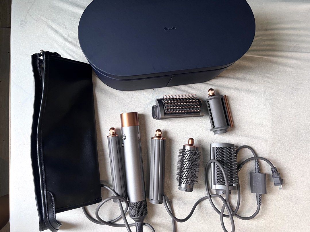 Original Dyson Airwrap V2 Complete Long (Negotiable, Please Send Your Offer) (Category: Hair) located in Taguig. Submitted by declutteringbean (Listing ID 1470602979, Image 2). Description: 💈Details * ₱13,500 (Negotiable, please send your offer) * Dyson Airwrap Multi-Styler Complete Long * Originally purchased at Dyson SM Aura in December 2022 for ₱32,900 * Original receipt included the photos * Includes: original storage / presentation case and