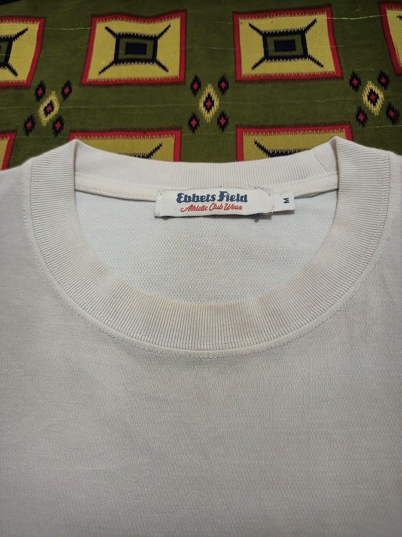 Ebbets Field White Tee (Category: Tshirts & Polo Shirts ) located in Lapu Lapu. Submitted by rebuild.arkives (Listing ID 1470621217, Image 3). Description: Ebbets Field White Tee ‎ ‎📏 Size Guide (Inches): ‎Length: 29 ‎Width: 22 ‎ ‎Color: 10/10 ‎Condition: 10/10 ‎Issue: None ‎ ‎📝 Heads up: ‎• This is a thrift item so please manage your expectations. ‎• Color may slightly differ due to lighting. ‎• Washed and ready to wear. ‎• Shipping Fee is not