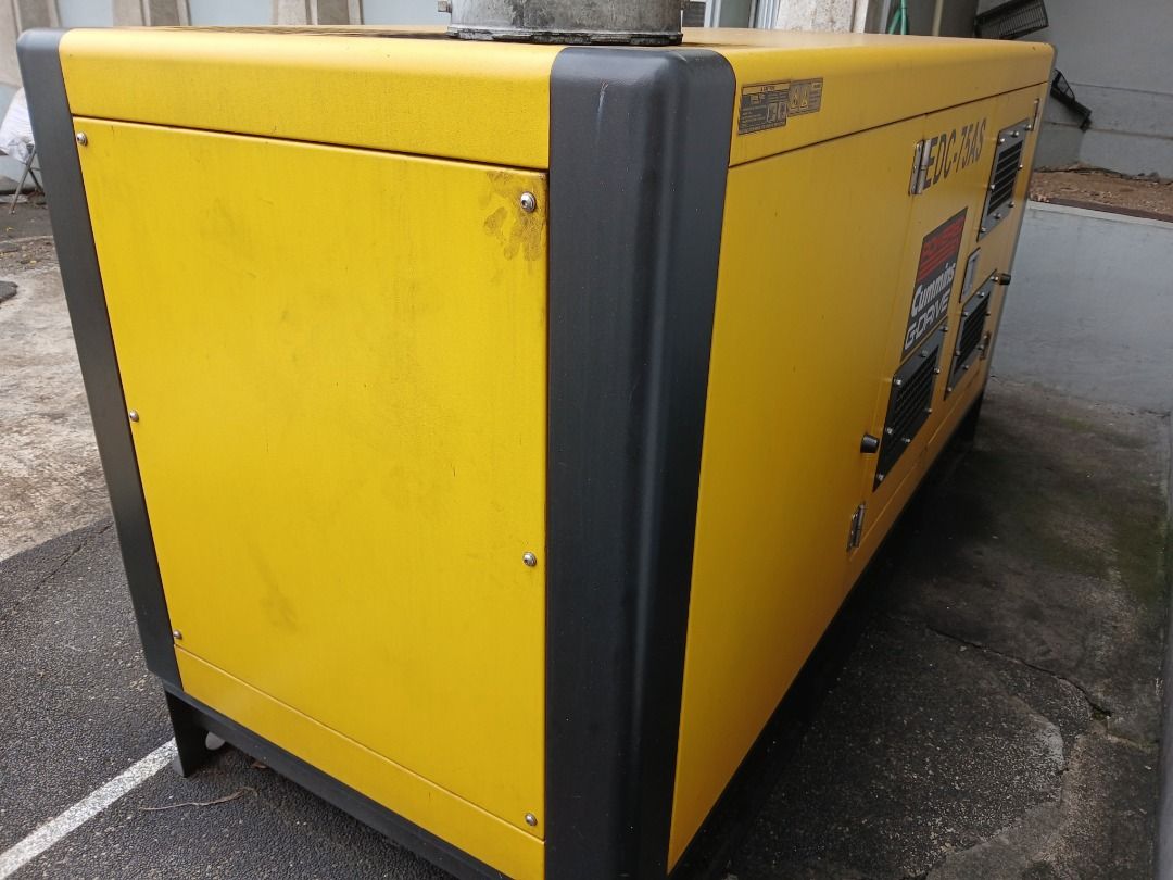 2nd Hand Diesel Generator (Category: Construction Tools & Equipment) located in Quezon City. Submitted by ladybern (Listing ID 1470663104, Image 2). Description: - Brand/Model: Edison Energy Systems EDC-75AS (Mfg by Fuzhou Hosem Power) - Power Output: 68kVA Rated / 75kVA Standby - Electrical Specs: 3 Phase 4 Wire, 60 Hz, 220V, 181.0A, 0.8 Lagging PF - Engine Speed: 1800 RPM - Dimensions & Weight: 2450 x 950 x 1250 mm, 1200 kg - Build & ID: Yellow