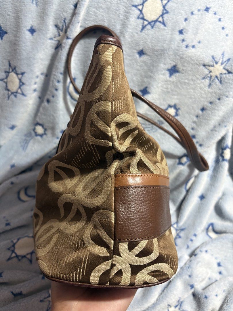 Elegance Brown Monogram Tote Bag with Tassel (Category: Tote Bags) located in Manila. Submitted by yanna1972 (Listing ID 1470700866, Image 3). Description: - price is negotiable for sure buyer - NO ISSUE 💓 - buy at ur own risk ! MOP: gcash or MariBank MOD : j&t and lalamove if within manila .
