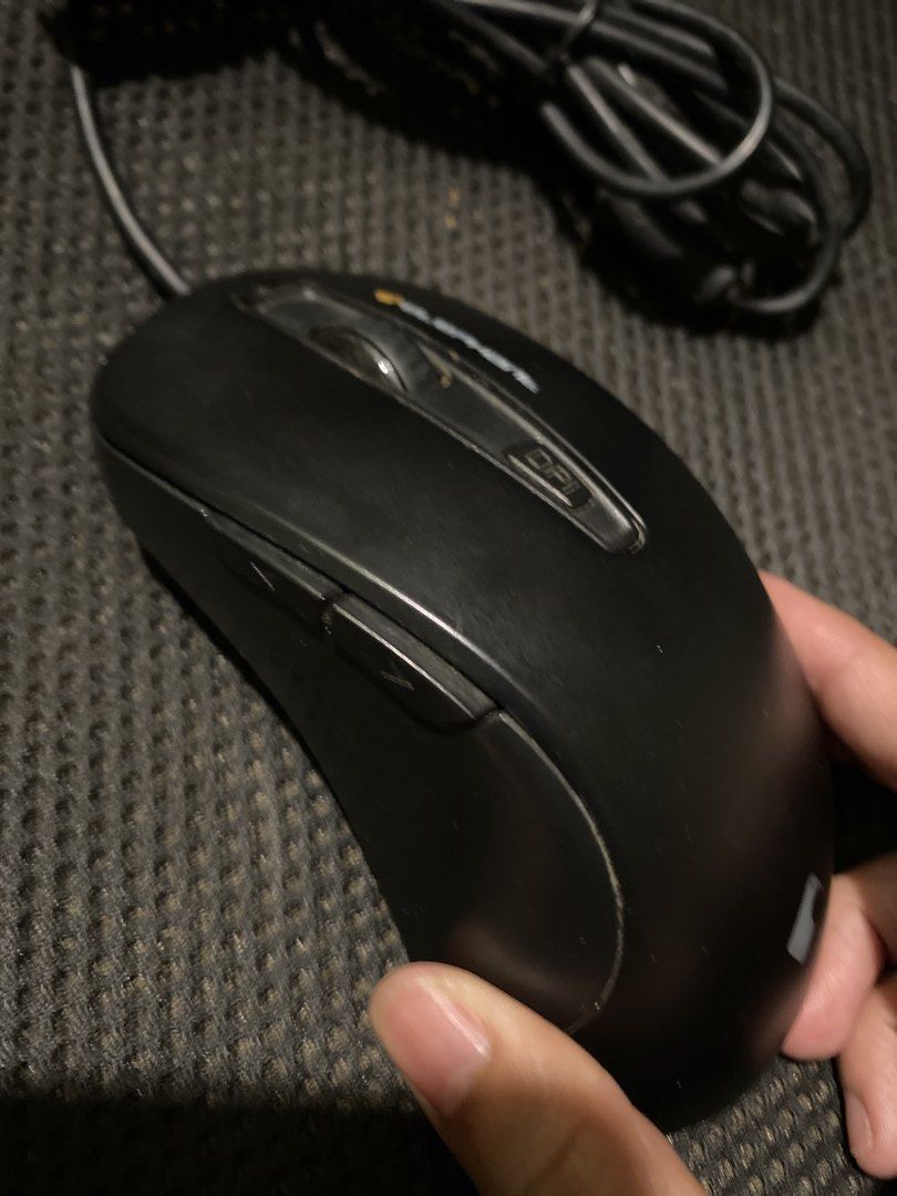 Elephant™ Sasquatch V2.0 WEM-1021 Blue-Sensor Gaming Mouse (Category: Mouse & Mousepads) located in Cainta. Submitted by stuff_4_sale_dump (Listing ID 1470655110, Image 3). Description: 12 x 6.5 x 3.3 cm matte black baked lacquer finish has switchable DPI levels (800 / 1200 / 1600 / 2400) and side arrow buttons wired USB cable, 1.8-meter *only used for office tasks, did not use for gaming.