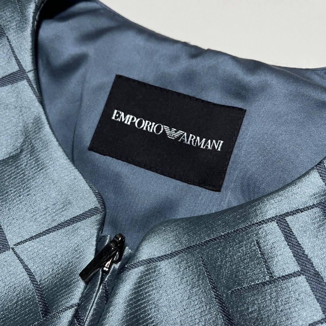 Emporio Armani Grey Geometric Pattern Zip Jacket (Category: Coats, Jackets and Outerwear) located in Caloocan City. Submitted by achilles_grails (Listing ID 1470728056, Image 3). Description: - Brand: Emporio Armani - Color/Pattern: Grey with geometric pattern - Size: EU 38 - Material: Polyester and polyamide blend - Origin: Made in Romania - Features: Full front zip closure, structured silhouette, smooth inner lining - Condition: Clean, excellen