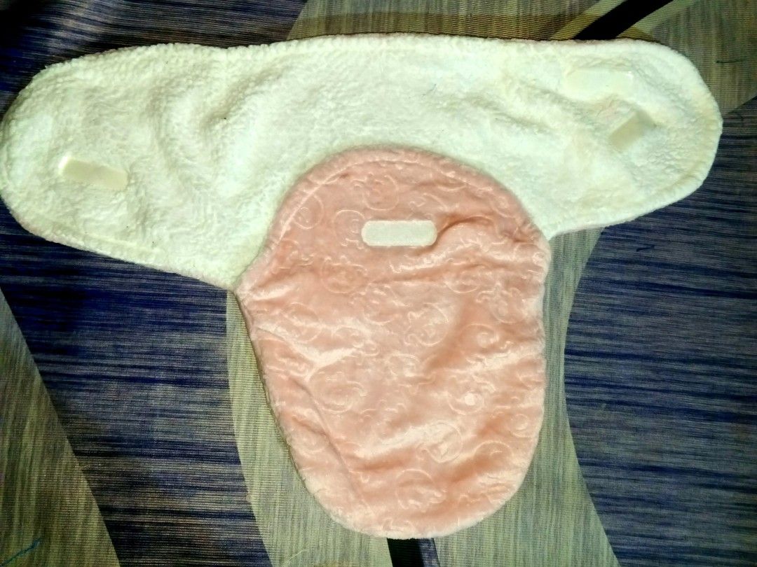 Envelope-style wrap with side flaps to secure a newborn. (Category: Babies & Kids Fashion) located in Manila. Submitted by icamalicdem29 (Listing ID 1470671314, Image 3). Description: Care and Fabric Instructions Fabric Content: 100% Polyester Washing: Machine wash cold, gentle cycle Bleaching: Do not bleach Drying: Tumble dry low Ironing: Warm iron as needed.