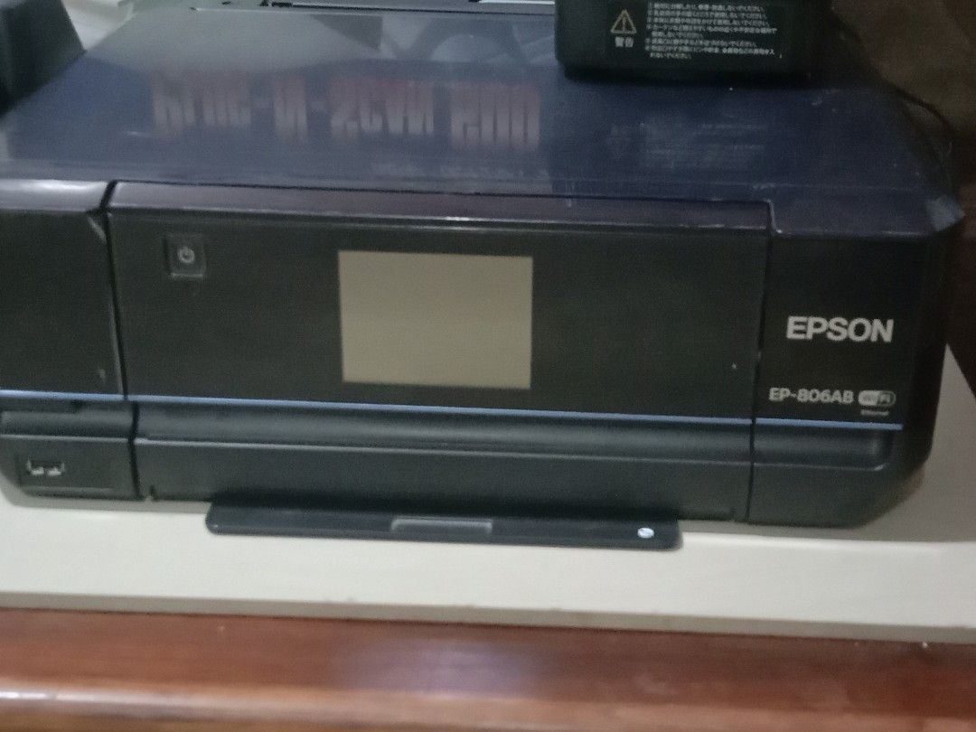 Epson printer scanner bundle 110v (Category: Printers, Scanners & Copiers) located in Manila. Submitted by redvincent01640 (Listing ID 1470586298, Image 2). Description: - Take-all bundle deal for only ₱799 - Includes Epson EP-806AB printer, scanner, and other electronics as seen in photos - Power requirement: 110v - Condition: Used, sold as-is - Please check photos for exact inclusions and item conditions.