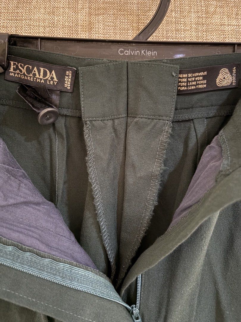 Escada Margaretha Ley Green Trousers (Category: Other Bottoms) located in Muntinlupa City. Submitted by jane226ph (Listing ID 1470683708, Image 2). Description: Classic ESCADA by Margaretha Ley Earlier collection / circa 1990s (estimated). An original high end luxury designer piece from our family’s private wardrobe collection, personally owned and kept in long term storage. Color Dark Green with Black velvet pocket accents, beautifully tailored 