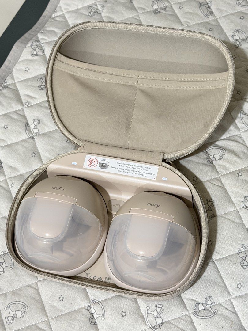 Eufy Wearable S1 Pro Breast Pump with Case (Category: Breastfeeding & Bottle Feeding) located in Mandaluyong City. Submitted by allorashoppe (Listing ID 1470660296, Image 1). Description: - like new, used for a month - RFS: I have better output with Spectra - Includes portable charging case, main pump units, and original retail box - Features heated pumping technology for a more comfortable expression - Hands-free, portable design perfect for bus