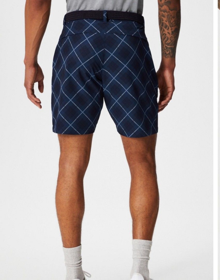 Fabletics Blue Plaid Golf Shorts With Zipper Pocket (Category: Activewear) located in Narra. Submitted by rhyanguan63087 (Listing ID 1470627718, Image 2). Description: 32-33 Waistline Navy blue plaid shorts from Fabletics. Diamond grid pattern. Water-repellent fabric handles light moisture easily. Zippered back pocket keeps phone secure. Belt loops at the waist. Clean design, ready for the course or casual wear..