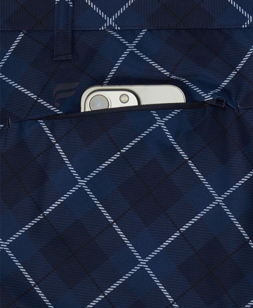 Fabletics Blue Plaid Golf Shorts With Zipper Pocket (Category: Activewear) located in Narra. Submitted by rhyanguan63087 (Listing ID 1470627718, Image 3). Description: 32-33 Waistline Navy blue plaid shorts from Fabletics. Diamond grid pattern. Water-repellent fabric handles light moisture easily. Zippered back pocket keeps phone secure. Belt loops at the waist. Clean design, ready for the course or casual wear..