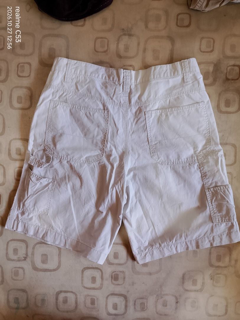 Faded Glory White Cotton Shorts Size 36 (Category: Shorts) located in General Santos City (Dadiangas). Submitted by peter_diaz1029 (Listing ID 1470598337, Image 2). Description: - Brand/Model: Faded Glory white utility shorts - Size: 36 - Material: 100% sturdy cotton for long-lasting wear - Features: Classic front and back pockets - Closure: Secure button closure and zipper fly - Style: Great for casual, everyday outfits.