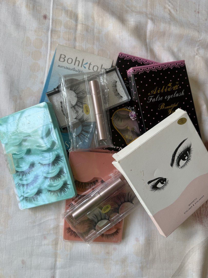False Eyelashes Bundle/ Lot Bohktoh Ailier Magnetic Lashes (Category: Makeup) located in Pasig City. Submitted by bitofahoarder (Listing ID 1470566213, Image 1). Description: - Massive false eyelash bundle featuring popular brands like Bohktoh and Ailier - Includes magnetic eyeliner and complete lash kits - Mix of brand new (unused) and partially used natural style trays - Great variety of styles, volumes, and thicknesses for any look - Comes com