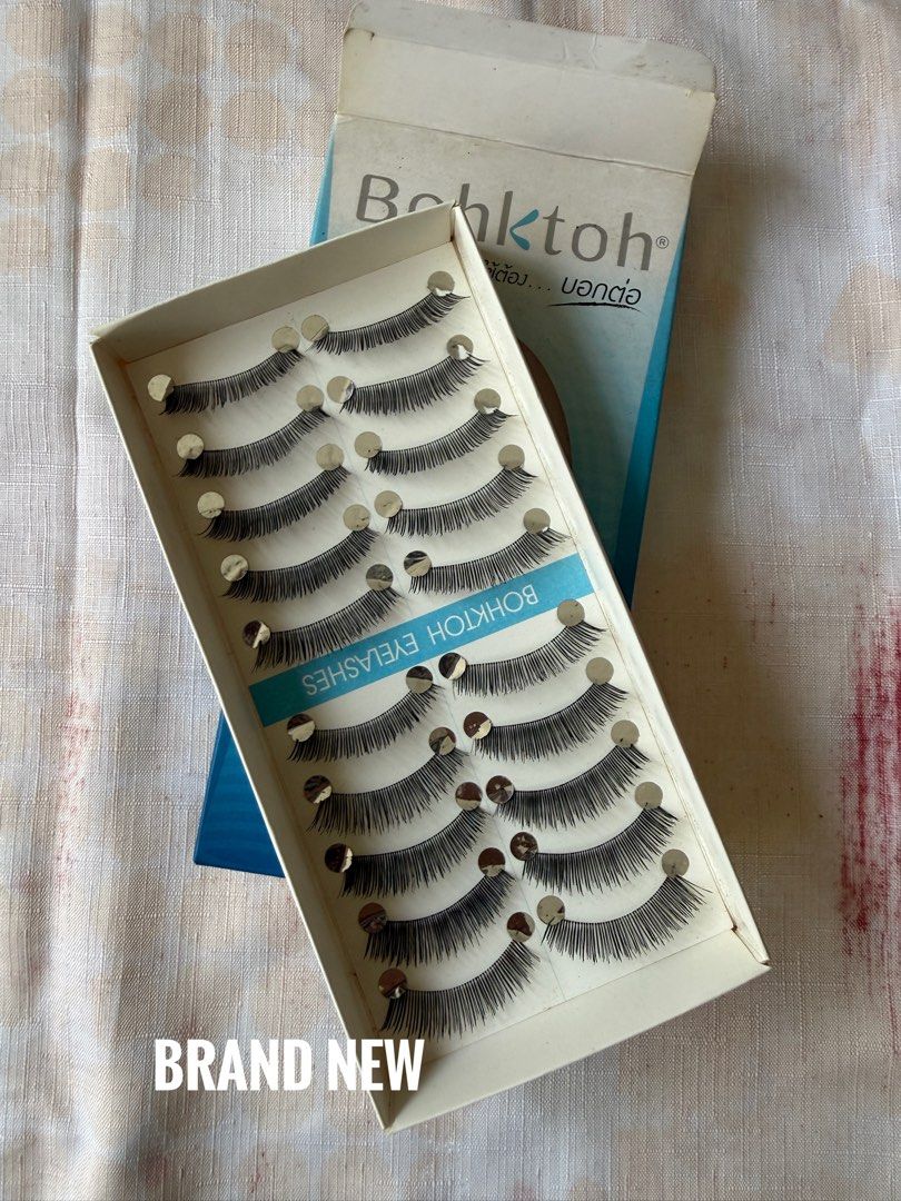 False Eyelashes Bundle/ Lot Bohktoh Ailier Magnetic Lashes (Category: Makeup) located in Pasig City. Submitted by bitofahoarder (Listing ID 1470566213, Image 3). Description: - Massive false eyelash bundle featuring popular brands like Bohktoh and Ailier - Includes magnetic eyeliner and complete lash kits - Mix of brand new (unused) and partially used natural style trays - Great variety of styles, volumes, and thicknesses for any look - Comes com