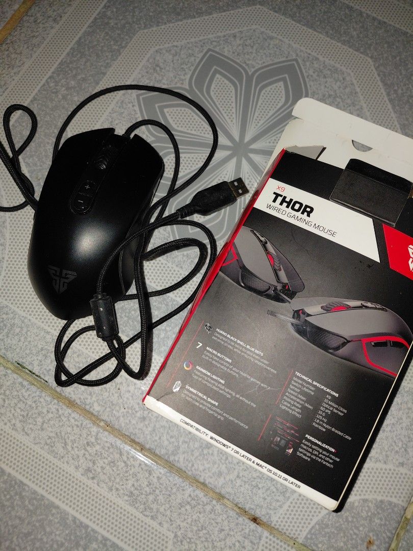 Fantech Thor X9 Wired Gaming Mouse P200 (Category: Mouse & Mousepads) located in Manila. Submitted by raestheticsells (Listing ID 1470701059, Image 1). Description: - Model: Fantech Thor X9 Wired Gaming Mouse (Black) - Connection: USB with durable braided cable and inline filter - Performance: Reliable optical sensor with programmable macro buttons - Aesthetics: Cool rainbow lighting effects - Inclusion: Comes with original retail box ORIGINAL PR