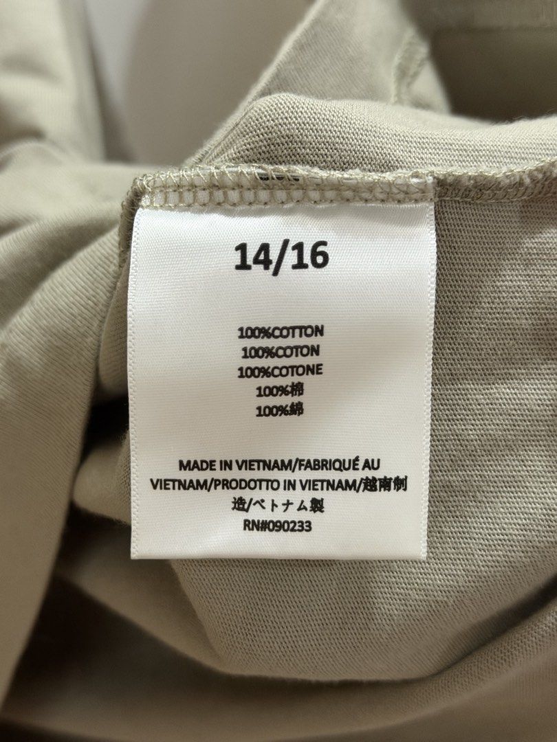 Fear of God Essentials Long Sleeve Tee (Category: Coats, Jackets and Outerwear) located in Naga. Submitted by oldthangs13 (Listing ID 1470682073, Image 3). Description: - Brand: Fear of God Essentials - Color: Light khaki / Taupe - Size: 14/16 (inner tag) - Condition: Like new -Authentic .