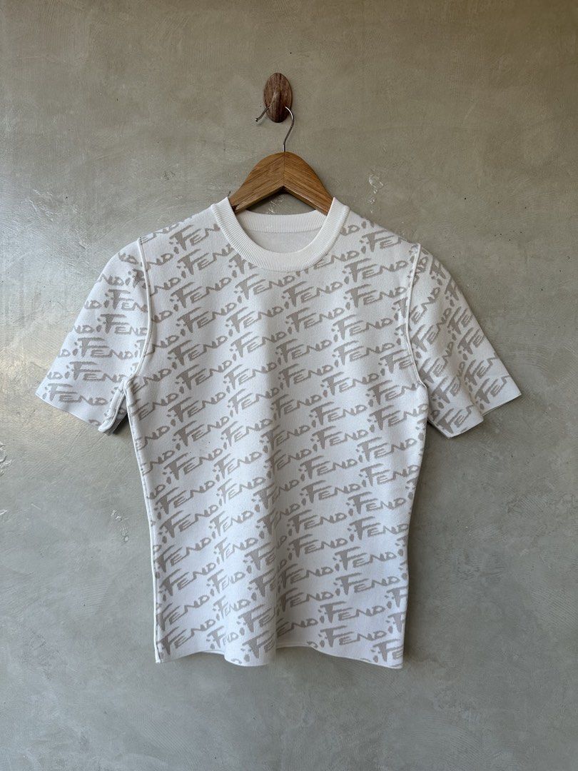 FENDI - Mono Script AOP Knit Shirt (Category: Others Tops) located in Cavite. Submitted by hand.picked (Listing ID 1470588692, Image 2). Description: FENDI - Mono Script AOP Knit Shirt Size: EU36 Dimension: 16” Width / 22” Length (stretchable) Condition: Like New.
