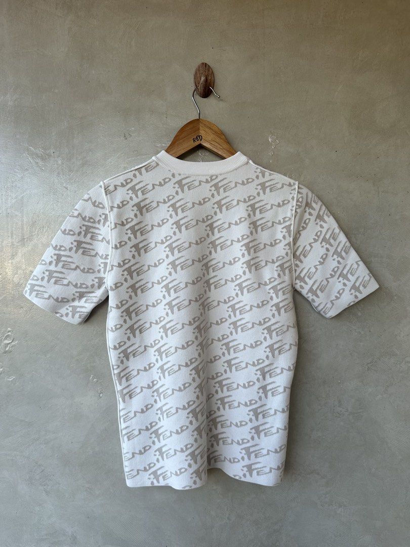 FENDI - Mono Script AOP Knit Shirt (Category: Others Tops) located in Cavite. Submitted by hand.picked (Listing ID 1470588692, Image 3). Description: FENDI - Mono Script AOP Knit Shirt Size: EU36 Dimension: 16” Width / 22” Length (stretchable) Condition: Like New.