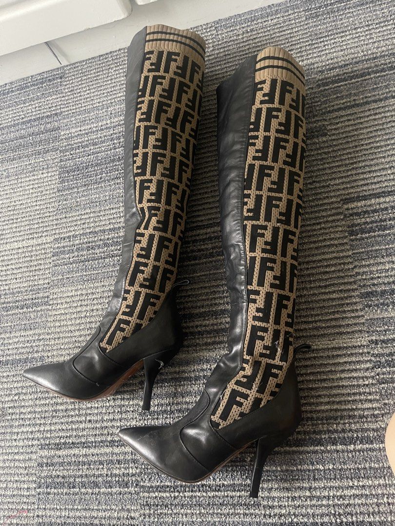 Fendi FF Logo Sock Boots Over-The-Knee Heels (Category: Boots) located in Rizal. Submitted by annelimited_stuffs (Listing ID 1470670930, Image 1). Description: - Authentic Fendi over-the-knee boots, Made in Italy - Size: 38 (printed on sole) - Material: Brown/black FF monogram knit fabric and black leather lower - Design: Pointed toe, stiletto heel, and stylish ribbed top cuff - Condition: Moderate wear on the soles and slight scuffs on the leath