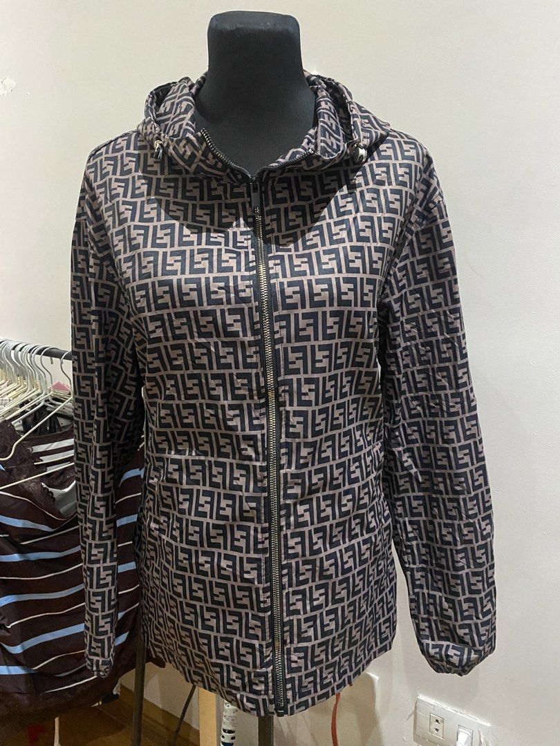 Fendi FF Monogram Zip Hoodie Jacket (Category: Luxury Apparel) located in Manila. Submitted by mpt99876 (Listing ID 1470596359, Image 1). Description: - Brand: NOT AUTH - Style: Zip-up hoodie jacket with adjustable drawstring hood - Design: Iconic all-over FF monogram pattern - Colorway: Brown and black - Material: Lightweight fabric, ideal for layering - Condition: Clean overall look with minimal signs of wear - Fast shipping available across th