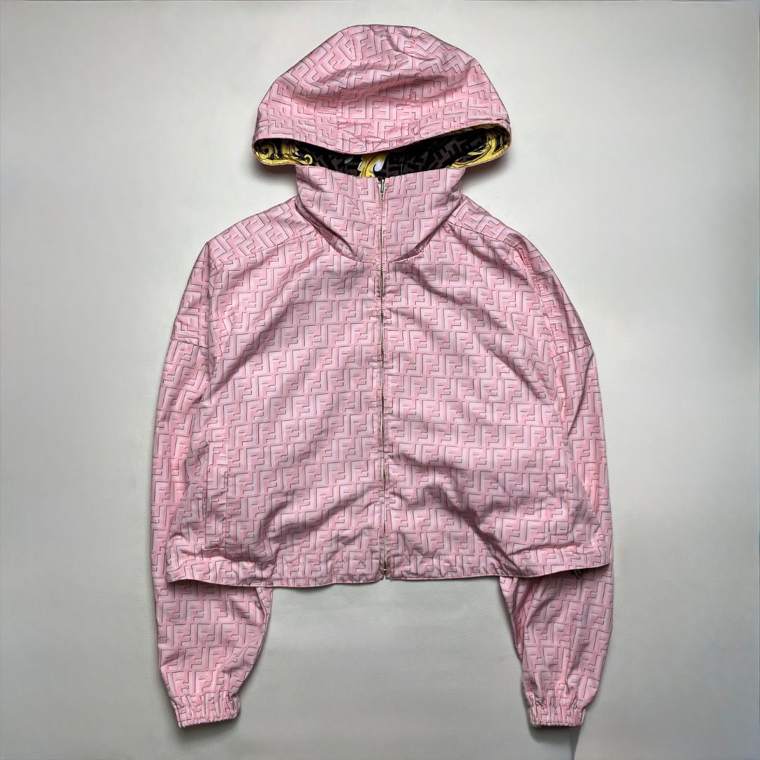 Fendi Versace Pink Reversible Hooded Jacket (Category: Coats, Jackets and Outerwear) located in Caloocan City. Submitted by achilles_grails (Listing ID 1470574830, Image 2). Description: - Brand: Fendi - Design 1: Pink with allover FF monogram pattern - Design 2: Fully reversible with bold gold baroque and cherub print - Features: High collar, full zip closure, custom branded zipper pull - Fit: Relaxed fit, lightweight material - Origin: Made in 