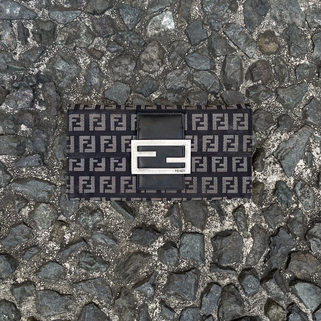 Fendi zucca continental Wallet (Category: Luxury Bags & Wallets) located in Manila. Submitted by walter_wt (Listing ID 1470677131, Image 2). Description: Fendi Zucchino FF Logo Canvas Continental Wallet from the 2000s collection, featuring the iconic FF buckle closure and silver-tone hardware Condition- 9/10 .