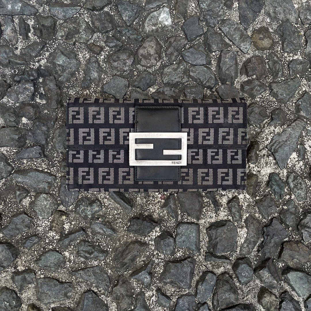 Fendi zucca continental Wallet (Category: Luxury Bags & Wallets) located in Manila. Submitted by walter_wt (Listing ID 1470677131, Image 3). Description: Fendi Zucchino FF Logo Canvas Continental Wallet from the 2000s collection, featuring the iconic FF buckle closure and silver-tone hardware Condition- 9/10 .