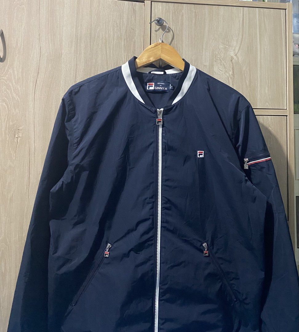 Fila bomber jacket (Category: Coats, Jackets and Outerwear) located in Binan City. Submitted by rnj_affordable (Listing ID 1470728883, Image 2). Description: no issue color navy blue.