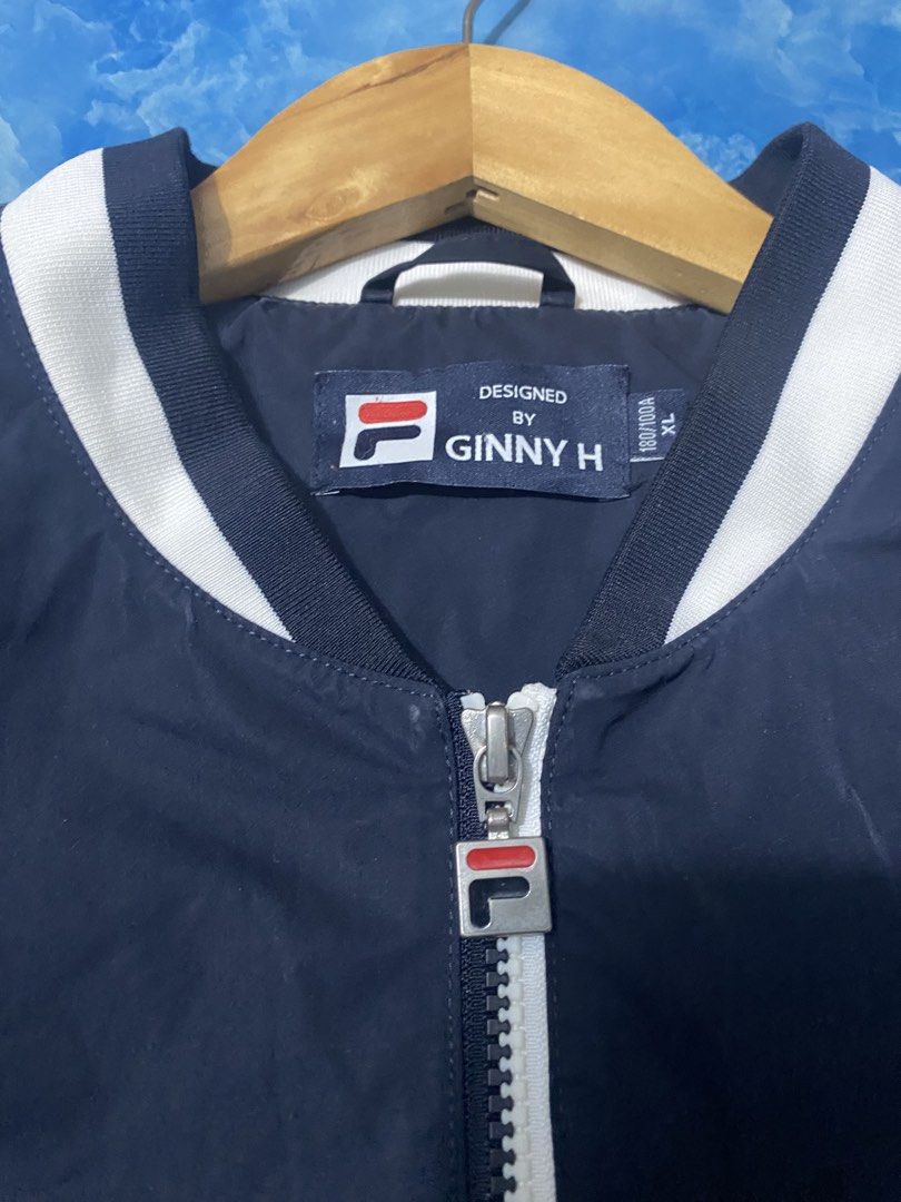 Fila bomber jacket (Category: Coats, Jackets and Outerwear) located in Binan City. Submitted by rnj_affordable (Listing ID 1470728883, Image 3). Description: no issue color navy blue.