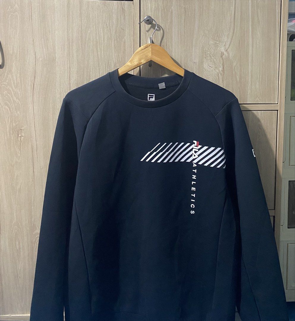 Fila Long sleeve crewneck (Category: Coats, Jackets and Outerwear) located in Binan City. Submitted by rnj_affordable (Listing ID 1470728958, Image 2). Description: no issue.