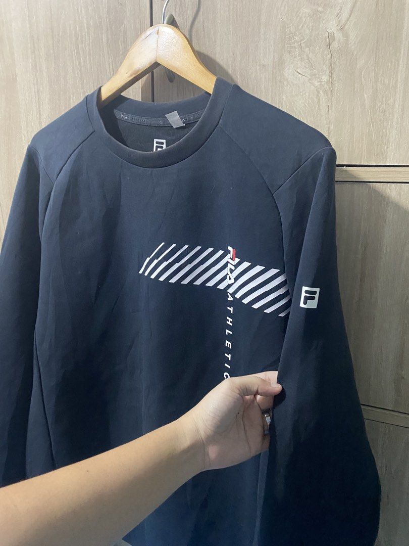 Fila Long sleeve crewneck (Category: Coats, Jackets and Outerwear) located in Binan City. Submitted by rnj_affordable (Listing ID 1470728958, Image 3). Description: no issue.