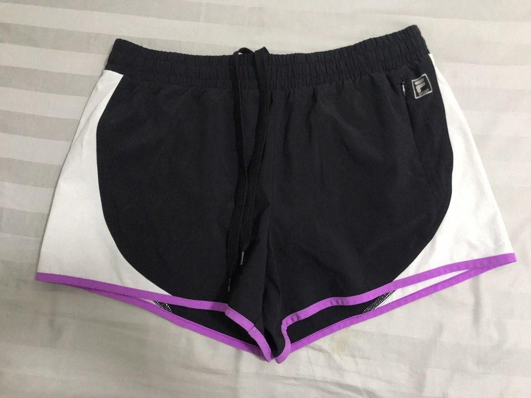 Fila Running Short (Category: Activewear) located in Manila. Submitted by freshlemon58885 (Listing ID 1470566842, Image 1). Description: With 1 sides zipper pocket With inner underwear Adjustable string Band Medium on tag Made in Vietnam .