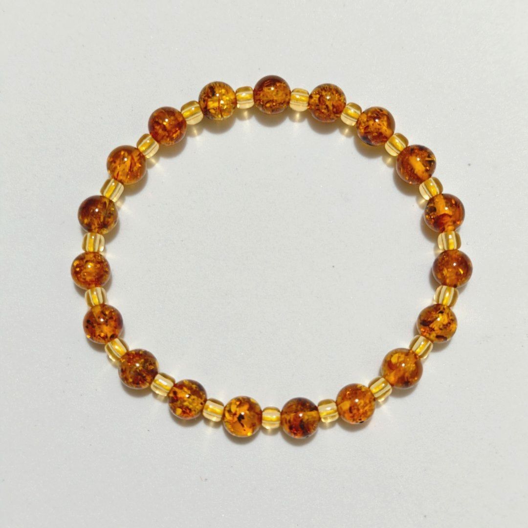 Flower Amber Bracelet 7mm (Category: Bracelets) located in Makati City. Submitted by lily.lala (Listing ID 1470602778, Image 2). Description: Flower Amber Bracelet 7mm - unused personal collection Payment: gcash/bank Delivery: lalamove/grab/lbc Rfs: downsizing.