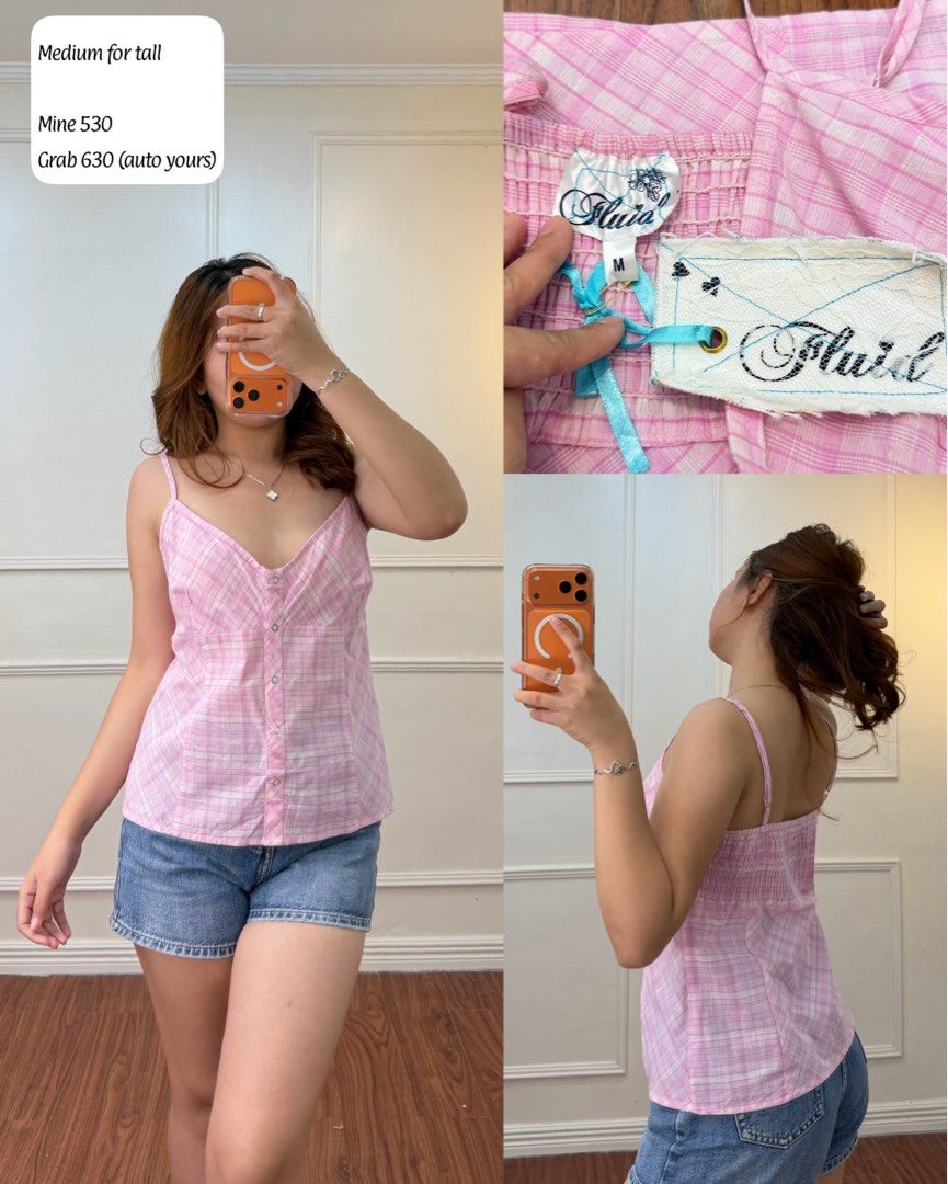 Fluid Pink Plaid Button Tank Top Medium (Category: Sleeveless) located in Manila. Submitted by angelll0123 (Listing ID 1470680501, Image 1). Description: - Size: Medium (great fit for talls) - Design: Pink plaid with V-neck and decorative front buttons - Straps: Spaghetti straps - Comfort: Stretchy smocked back panel - Style: Soft pastel colors, perfect to pair with denim shorts or skirts.