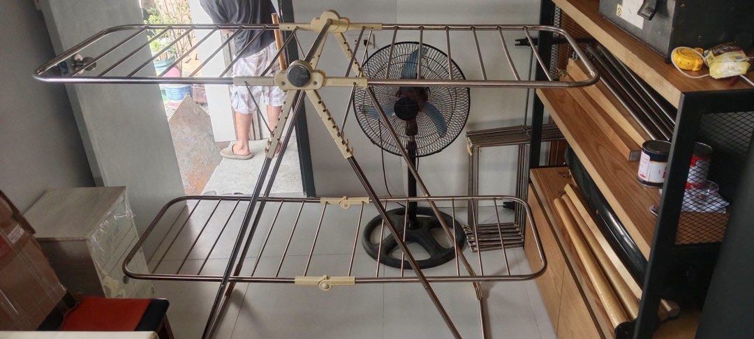 Foldable Stainless Drying Rack (Category: Clothes Drying Rack) located in Malabon City. Submitted by aven25 (Listing ID 1470633092, Image 1). Description: Foldable Stainless Drying Rack Size: 61.5 x 23 x 47 inches Height Good Condition Ready to Use .