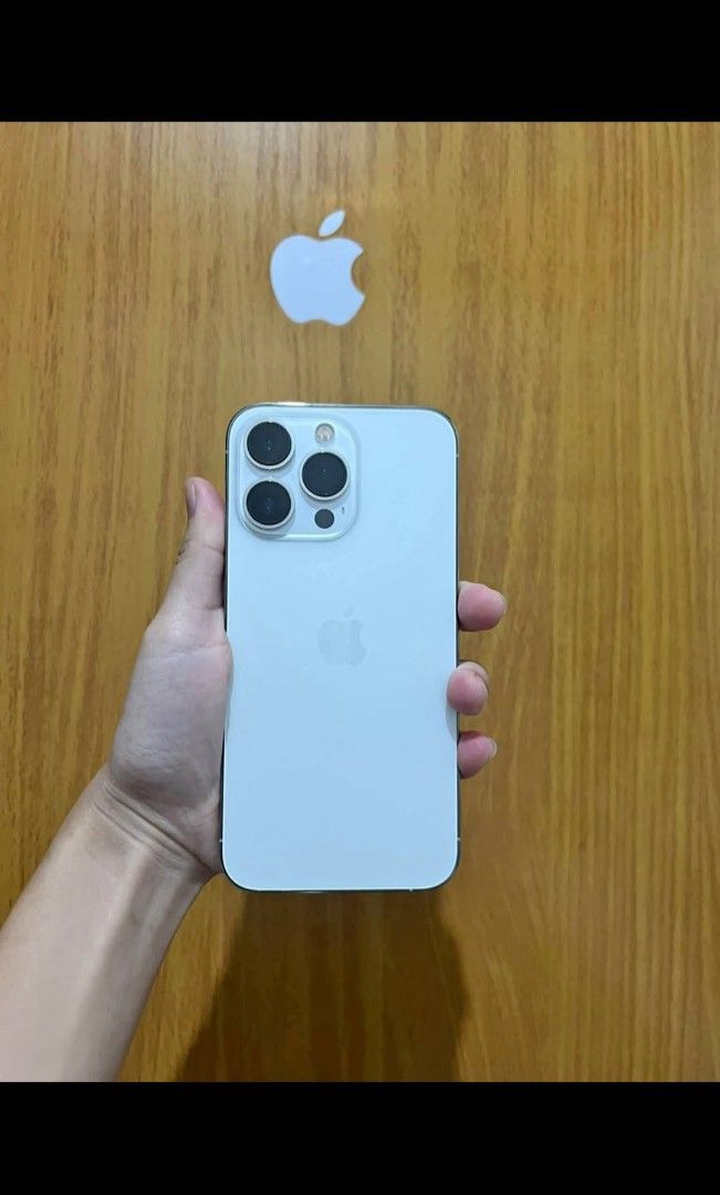 For Sale (Category: iPhone 13 Series) located in Manila. Submitted by safedragon.1a30b2 (Listing ID 1470653563, Image 1). Description: for sale or swap sa lower unit plus cash - 13 promax - 128gb - all original parts - malinaw b and f cam - sariwa - makinis - 73 bh makunat orig pa - 13,500 if sale pref swap sa lower unit na may add cash.