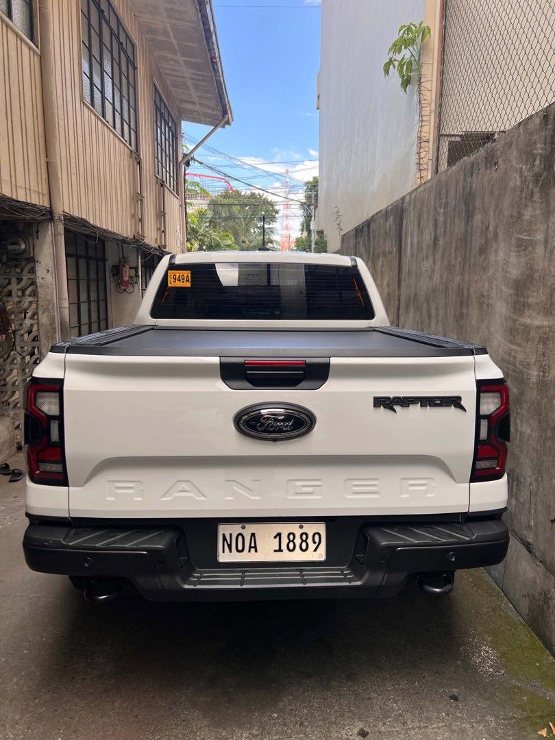 Ford Raptor 4x4 Auto (Category: Used Cars) located in Mandaluyong City. Submitted by kopitiandbiscuits (Listing ID 1470598820, Image 3). Description: For Sale Ford Raptor 2024 Model (White) * Stock * Friday Coding * 24k mileage * Mountain Top bed cover * Comprehensive Insurance May 2027 * Registered until Oct 2027 * Complete papers OR/CR * NCR Registered * Complete Accessories 2 remote keys * 1.9M - FIRM 📍Mandaluyong City.