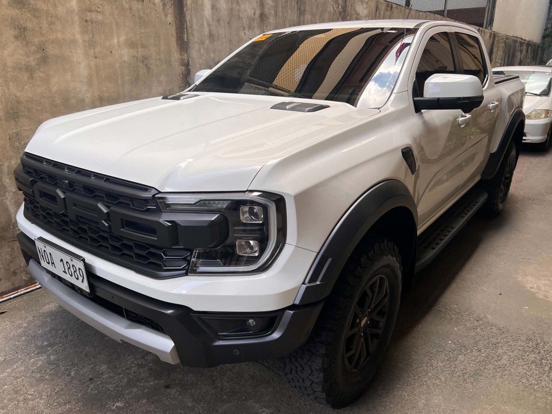 Ford Raptor 4x4 Auto (Category: Used Cars) located in Mandaluyong City. Submitted by kopitiandbiscuits (Listing ID 1470598820, Image 2). Description: For Sale Ford Raptor 2024 Model (White) * Stock * Friday Coding * 24k mileage * Mountain Top bed cover * Comprehensive Insurance May 2027 * Registered until Oct 2027 * Complete papers OR/CR * NCR Registered * Complete Accessories 2 remote keys * 1.9M - FIRM 📍Mandaluyong City.