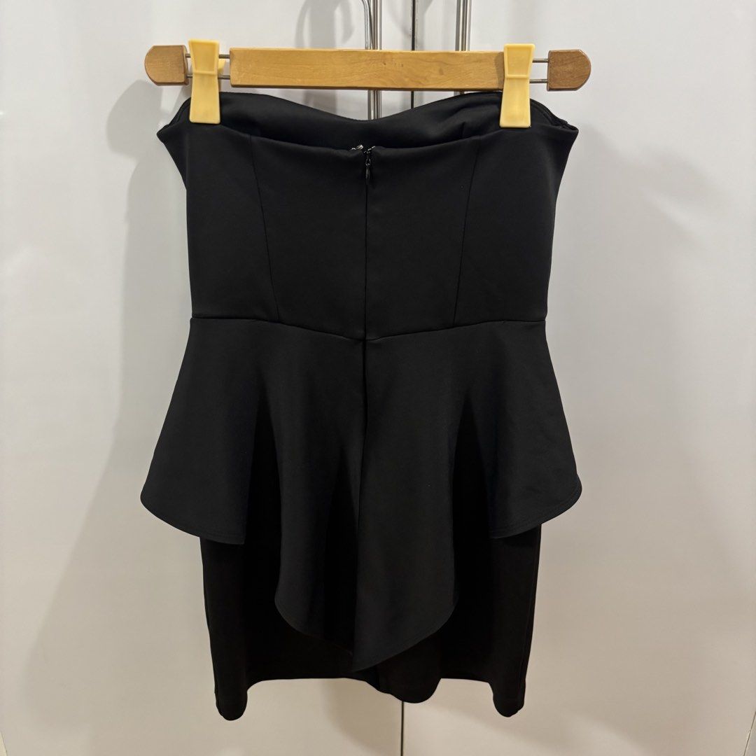 Forever 21 Black Strapless Peplum Dress (Category: Dresses) located in Makati City. Submitted by trustmebuythis (Listing ID 1470713643, Image 2). Description: - Size: M (Made in USA) - Color: Classic Black - Style: Strapless, fitted bodycon silhouette - Details: Dramatic peplum waist with a stylish high-low hem overlay in the back - Closure: Convenient back zipper - Material: Comfortable, stretchy fabric - Worn once.