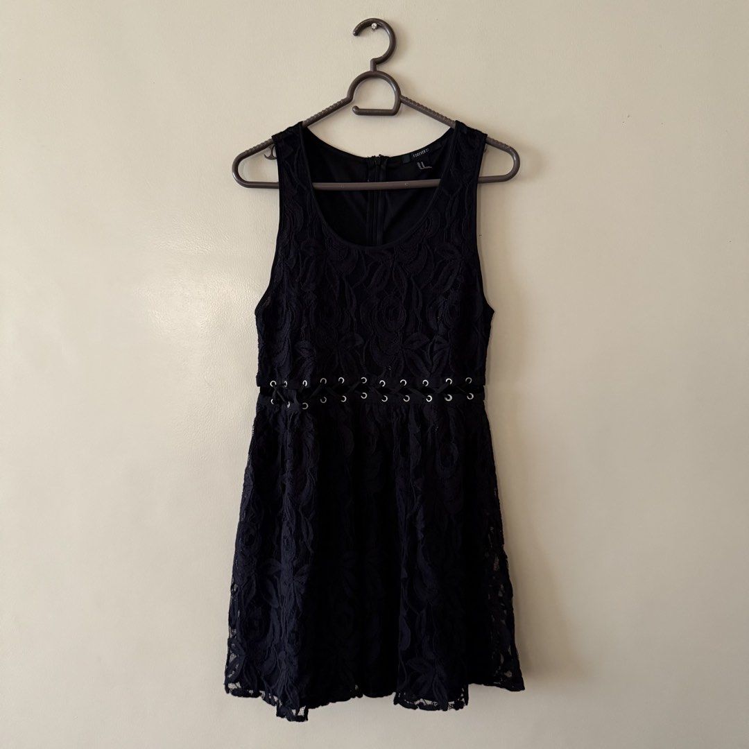 Forever 21 Lace Black Dress (Category: Dresses) located in Quezon City. Submitted by declutteringoodfinds (Listing ID 1470629632, Image 1). Description: Color: Black With zipper at the back With inner lining RFS: Decluttering impulsive buys.
