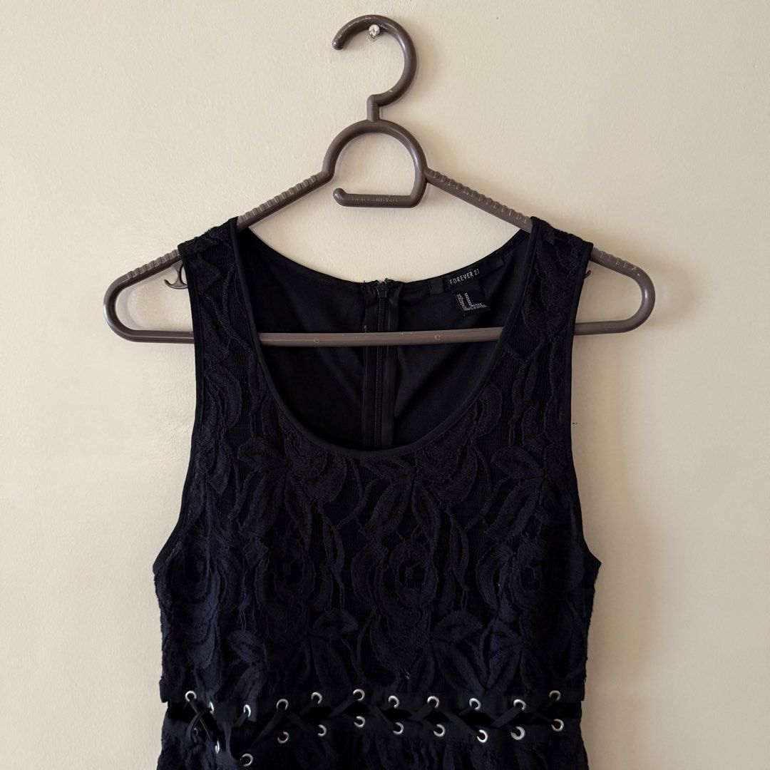 Forever 21 Lace Black Dress (Category: Dresses) located in Quezon City. Submitted by declutteringoodfinds (Listing ID 1470629632, Image 2). Description: Color: Black With zipper at the back With inner lining RFS: Decluttering impulsive buys.