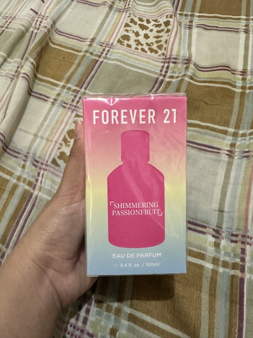 Forever 21 Shimmering Passionfruit Eau De Parfum 100ml (Category: Fragrance & Deodorants) located in Bugallon. Submitted by lavenderlane (Listing ID 1470617259, Image 1). Description: - Brand: Forever 21 - Fragrance: Shimmering Passionfruit - Volume: 3.4 fl oz / 100 mL - Notes: Passion fruit, fresh basil, coconut milk - Condition: Brand new, still wrapped in original plastic packaging.