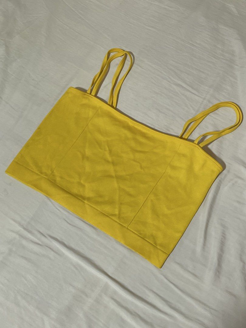 Forever 21 Yellow Ribbed Double Strap Crop Top (Category: Sleeveless) located in Caloocan City. Submitted by sheshesheshesheshe13 (Listing ID 1470713723, Image 1). Description: - Brand: Forever 21 - Color: Bright yellow - Design: Double-strap on both shoulders, ribbed knit texture - Fit: Crop top, pullover style, highly stretchable - Condition: Great basic piece for warm weather and high-waisted bottoms.