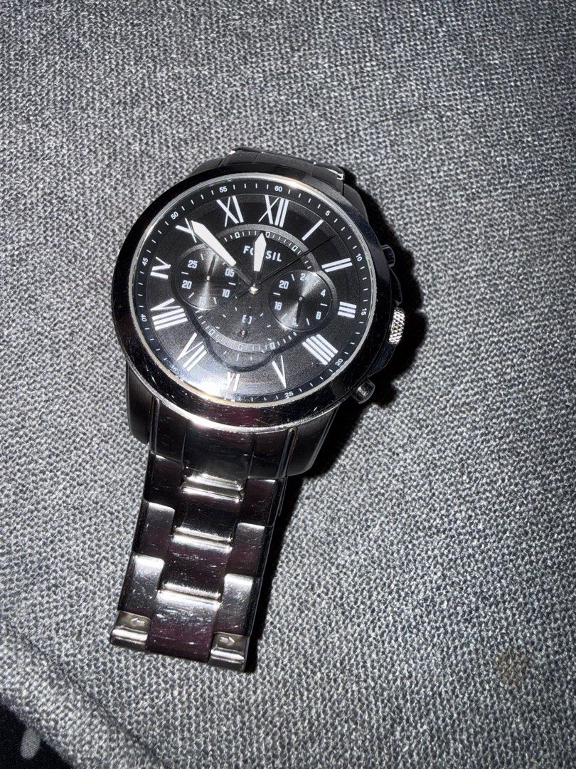 Fossil Chronograph Steel Watch FS4735 (Category: Men's Watches) located in Manila. Submitted by rare.desteen (Listing ID 1470563190, Image 1). Description: - Brand: Fossil Men's Chronograph Watch - Model: FS4735 - Material: Stainless steel case and solid metal bracelet with deployment clasp - Dial: Black dial with classic Roman numerals and three functional sub-dials - Water Resistance: 5 ATM - Condition: Keeps accurate time, shows normal everyda