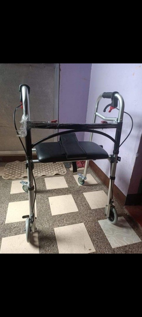 Four Wheel Mobility Walker with Seat and Brakes (Category: Wheelchairs) located in Taguig. Submitted by grandfish_55ab5c (Listing ID 1470569150, Image 1). Description: - 4-wheel rolling walker with secure hand brakes - Built-in padded seat for comfortable resting - Adjustable handle height to fit your needs - Lightweight silver aluminum frame with black upholstery - Folds down easily for transport and storage - Great mobility support for seniors 
