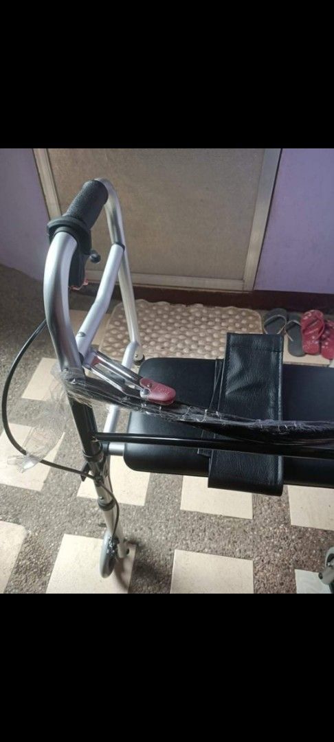 Four Wheel Mobility Walker with Seat and Brakes (Category: Wheelchairs) located in Taguig. Submitted by grandfish_55ab5c (Listing ID 1470569150, Image 2). Description: - 4-wheel rolling walker with secure hand brakes - Built-in padded seat for comfortable resting - Adjustable handle height to fit your needs - Lightweight silver aluminum frame with black upholstery - Folds down easily for transport and storage - Great mobility support for seniors 