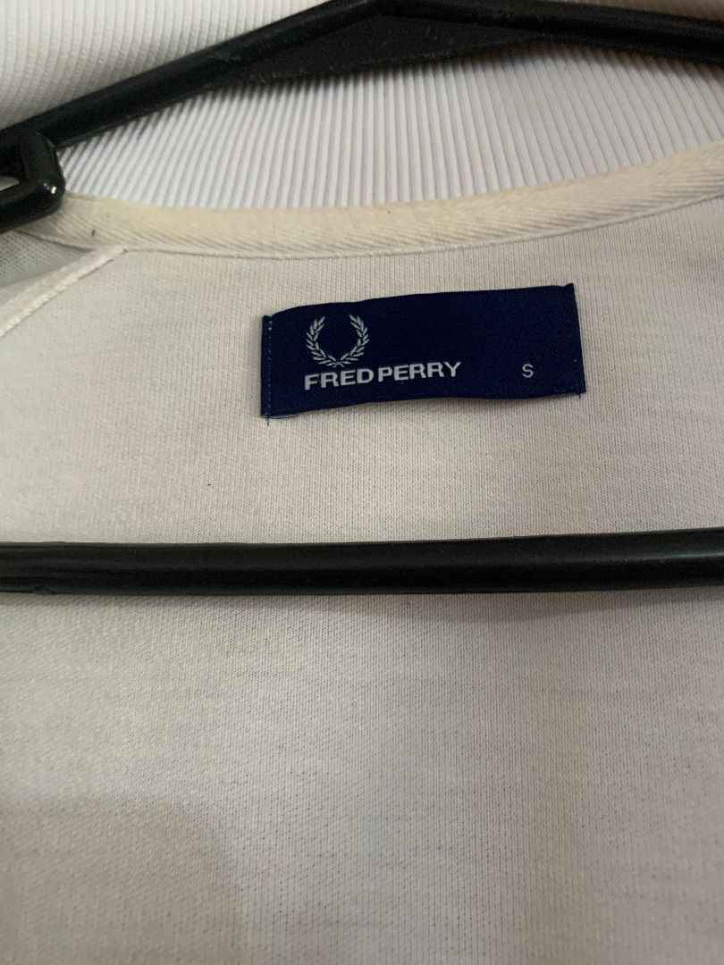 Fred Perry - Track Jacket (Category: Coats, Jackets and Outerwear) located in Paranaque City. Submitted by bulldogdad (Listing ID 1470624603, Image 2). Description: - White with black logo and side stripes - Zip-up front, high-neck collar - Retro Mod design - Used only twice.