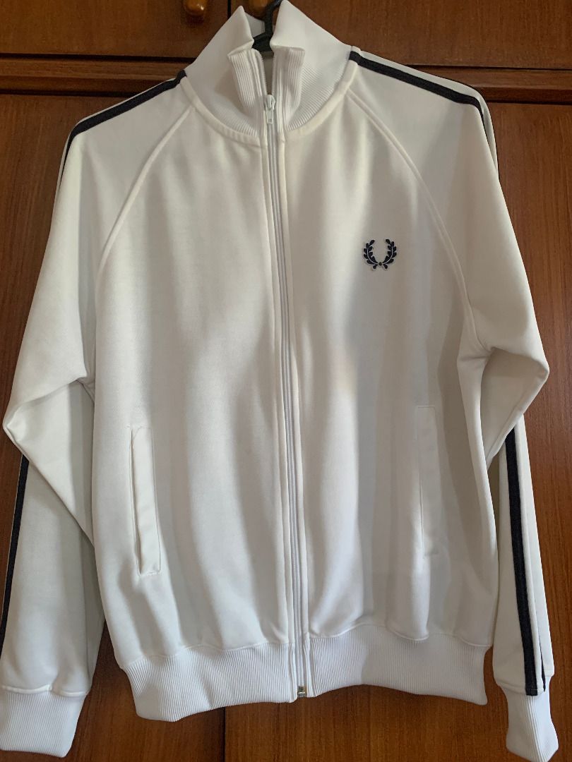 Fred Perry - Track Jacket (Category: Coats, Jackets and Outerwear) located in Paranaque City. Submitted by bulldogdad (Listing ID 1470624603, Image 1). Description: - White with black logo and side stripes - Zip-up front, high-neck collar - Retro Mod design - Used only twice.