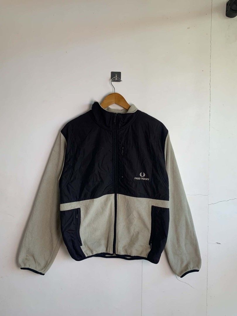 Fred Perry Fleece Zip Jacket Black Beige Size M (Category: Coats, Jackets and Outerwear) located in Manila. Submitted by michaelge38472 (Listing ID 1470705569, Image 1). Description: - Brand: Fred Perry - Item: Fleece zip jacket - Color: Black and beige color block - Size: Medium (tag on collar) - Features: Full zip front, contrast upper chest fabric, zippered pockets, embroidered laurel wreath logo - Condition: Selling as-is, note noticeable bro