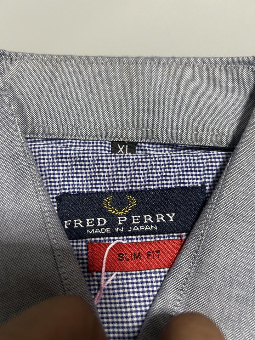 Fred perry japan button down polo (authentic) (Category: Formal Shirts) located in Trece Martires City. Submitted by flip_flips (Listing ID 1470699104, Image 3). Description: Fred perry japan button down polo (authentic) -Dimes: 22 width 29 length -excellent condition -9.5/10 color rate -issue: none.